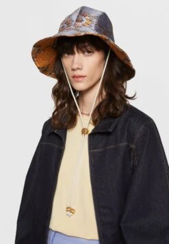 Tory Burch Monogram Bucket Hat - Hat - Baroque Rust -Tory Burch 2a3f81c70c62467faabae7edcbcb9390