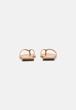 Tory Burch Simple Logo Thong - T-Bar Sandals 10 Tory Burch Simple Logo Thong - T-Bar Sandals -Tory Burch 6c056f9a1b13499f87cbe4b53c5f681e